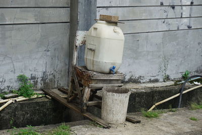 An emergency hand washing place using gallon water and buckets  to  in terms of hand hygiene