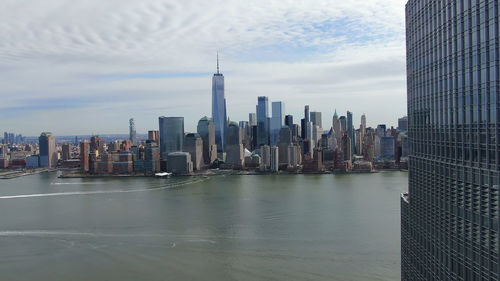 Modern buildings in city against sky