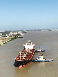 High angle view of ship in sea against clear sky