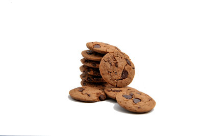 Close-up of cookies against white background