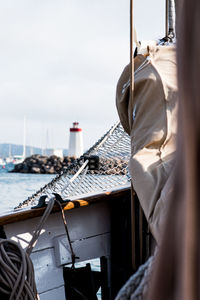 Low section of woman standing on boat