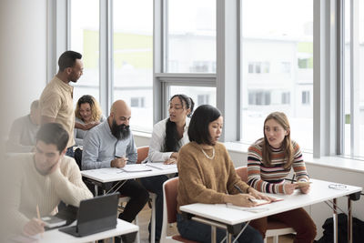 Teacher and adult students in class