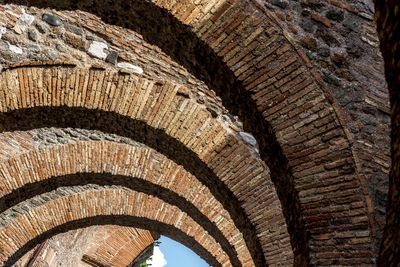 Low angle view of brick arcade