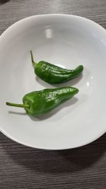 High angle view of vegetables in plate on table
