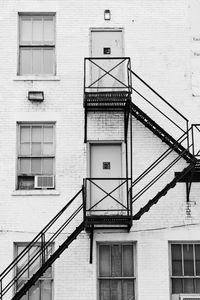 Low angle view of building and outdoor fire escape - empty space for text - empty neighbourhood 