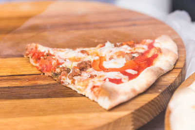 Close-up of pizza on cutting board