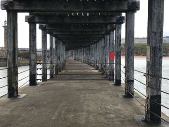 View of pier with bridge in background