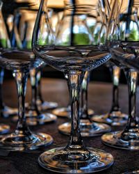 Close-up of wineglasses on table