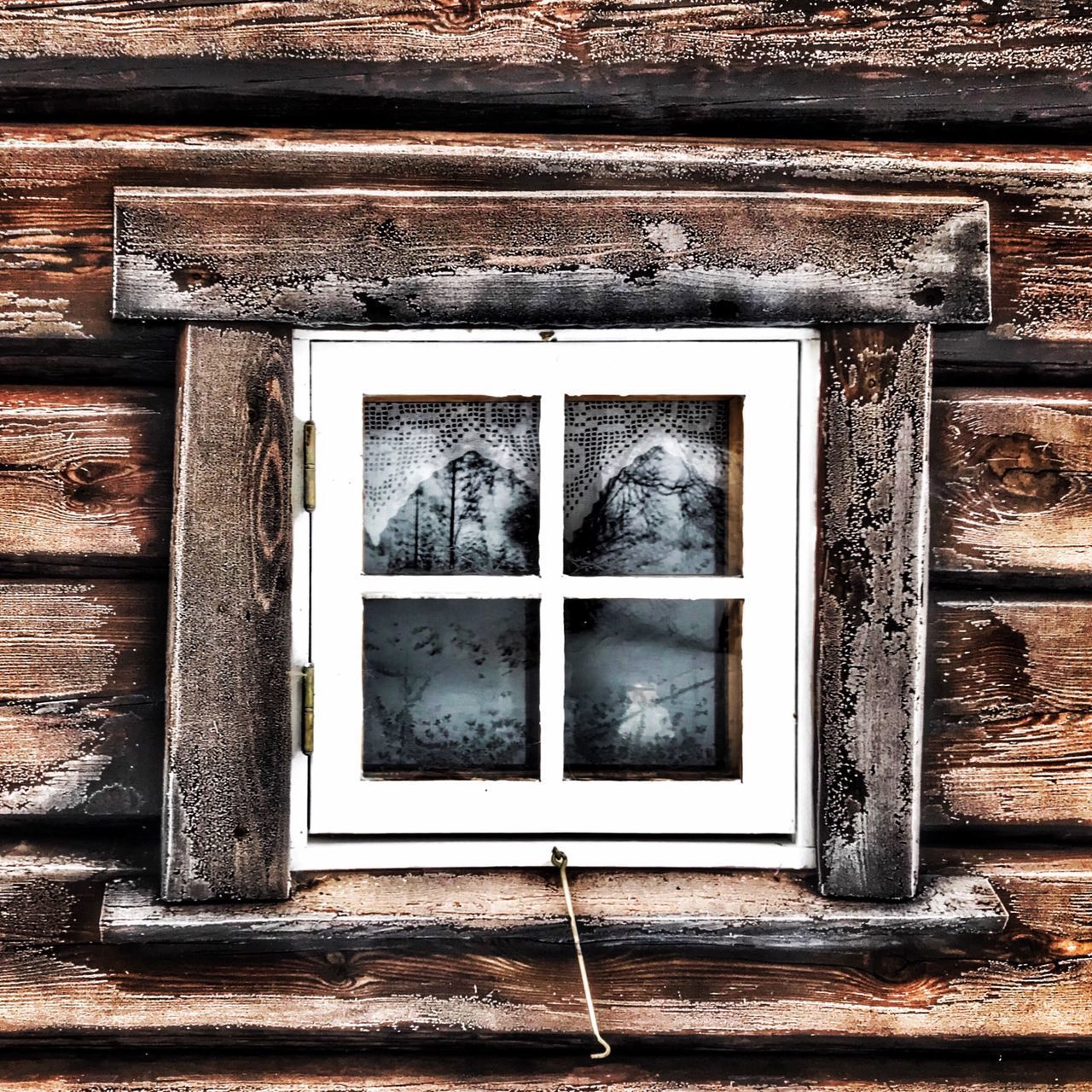 CLOSE-UP OF WINDOW ON BUILDING