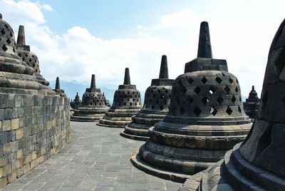 Ancient temple against building