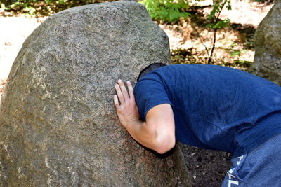 High angle view of man on rock