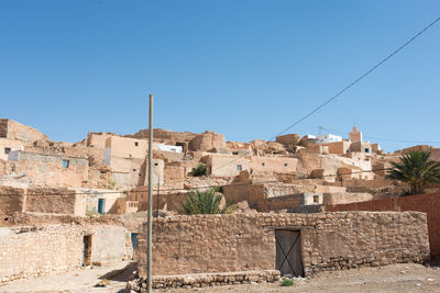 Old ruins against clear blue sky