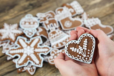 Close-up of christmas gingerbread cookies on wooden surface