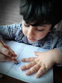 Close-up of girl holding paper