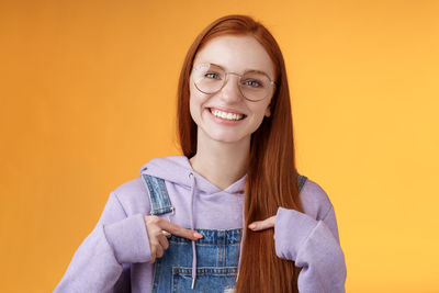 Portrait of smiling young woman