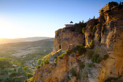 Castle on mountain against sky