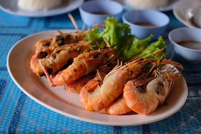 High angle view of prawns in plate on table