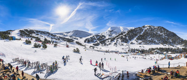 Wide, panoramic view on bars and restaurants, ski slopes and mountains, andorra