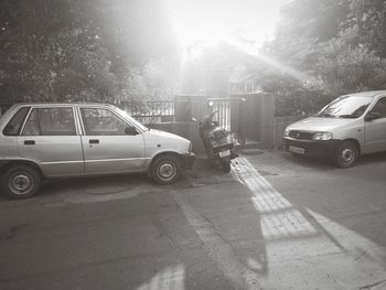 Cars on car against sky