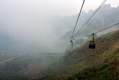 Overhead cable car over mountains