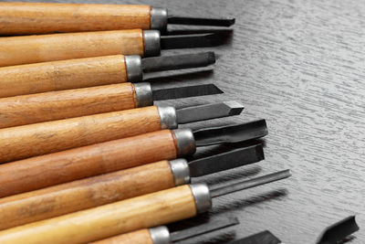Close-up of make-up brushes on table