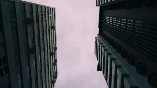 Modern buildings in city against sky