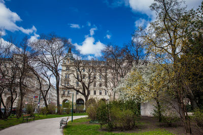 Street amidst buildings against sky