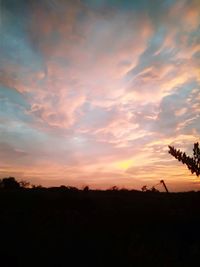Scenic view of silhouette landscape against sky during sunset