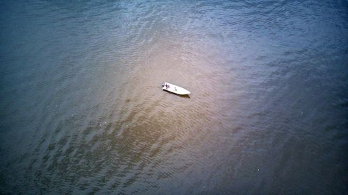 High angle view of boat sailing on sea