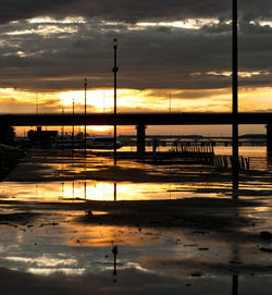 Silhouette of bridge at sunset