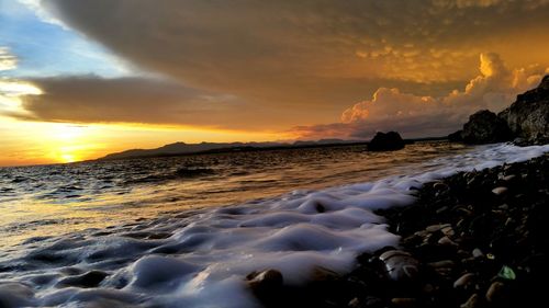 Scenic view of sea against sky during sunset