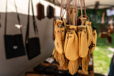 Close-up of clothes hanging on rope at home