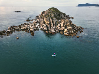 Aerial view of sup surfer ,triozerye, primorsky region, russia