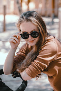 Portrait of woman wearing sunglasses