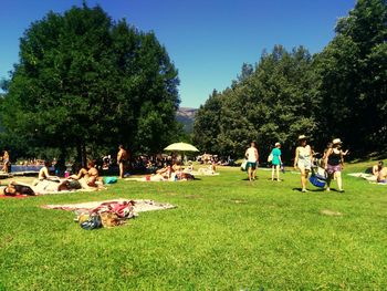 People relaxing in park