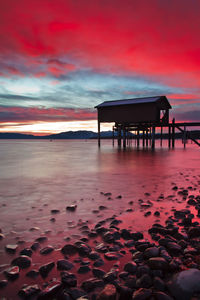 Scenic view of sea against sky at sunset