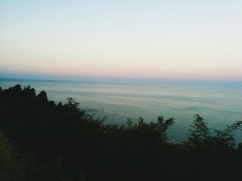 High angle view of calm sea at sunset