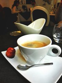 Close-up of cappuccino on table