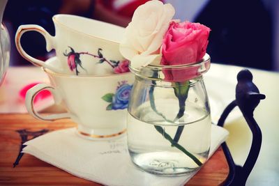 Close-up of flower in cup on table