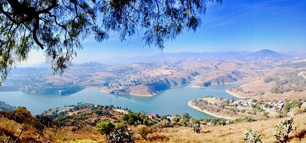 Scenic view of landscape against clear blue sky