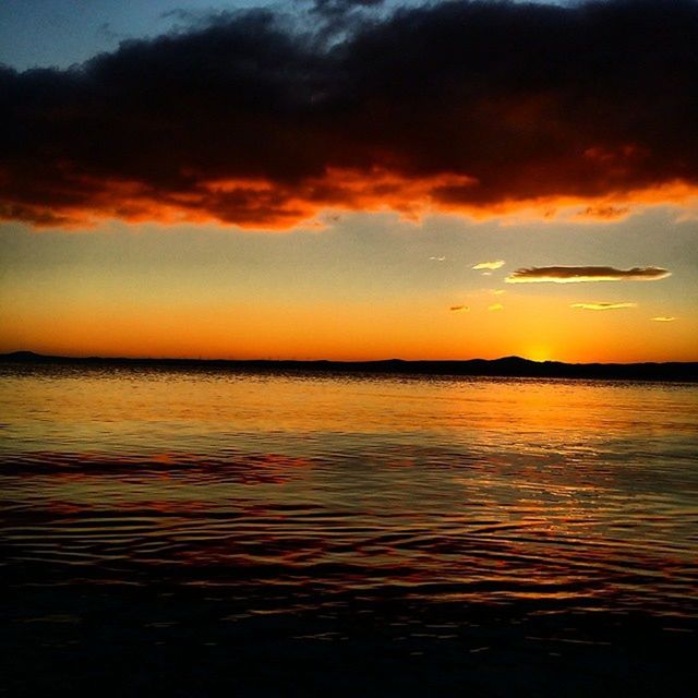 sunset, water, scenics, sky, orange color, tranquil scene, beauty in nature, tranquility, cloud - sky, sea, idyllic, waterfront, dramatic sky, nature, reflection, cloud, cloudy, rippled, horizon over water, dusk