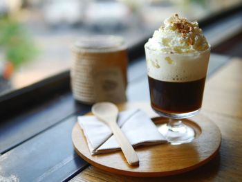 Close-up of coffee served on table