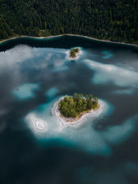 High angle view of island in blue lake