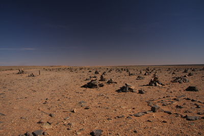 Scenic view of desert against clear sky