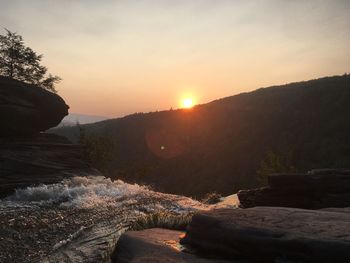 Scenic view of mountains against sky during sunset