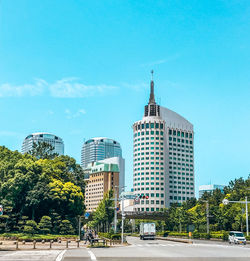 Modern buildings against sky in city