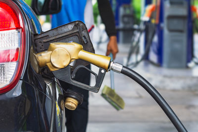 Cropped image of man riding bicycle