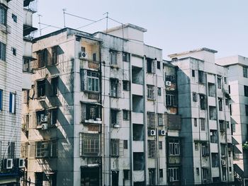 Low angle view of buildings against sky