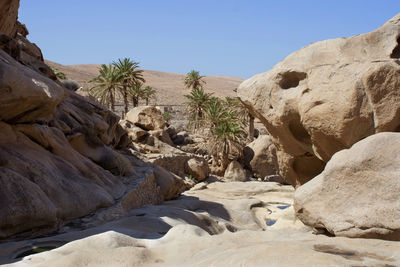 Scenic view of rock formations against sky