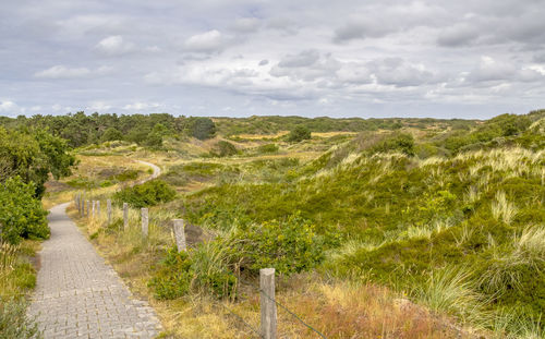 Scenic view of land against sky